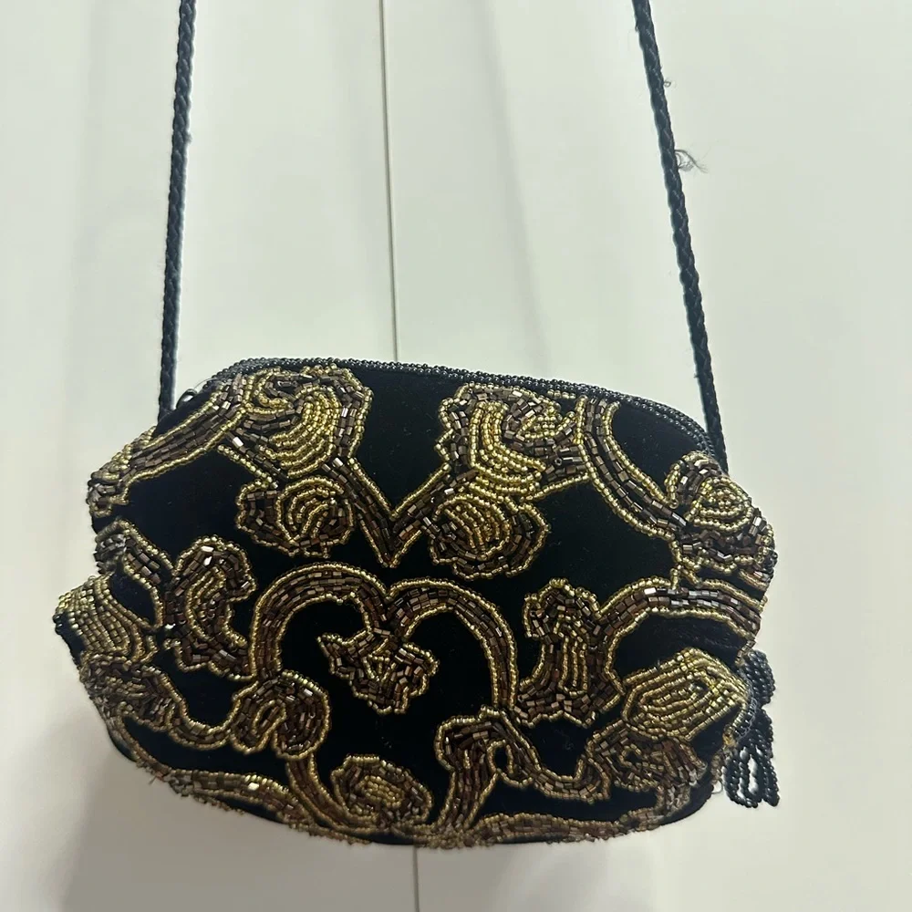 Luxurious Black and Gold Beaded Clutch